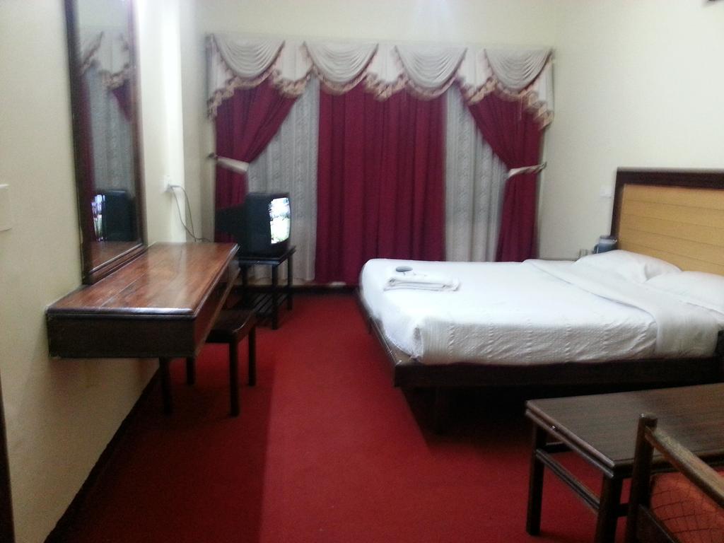 Hotel Preethi Palace Ooty Chambre photo